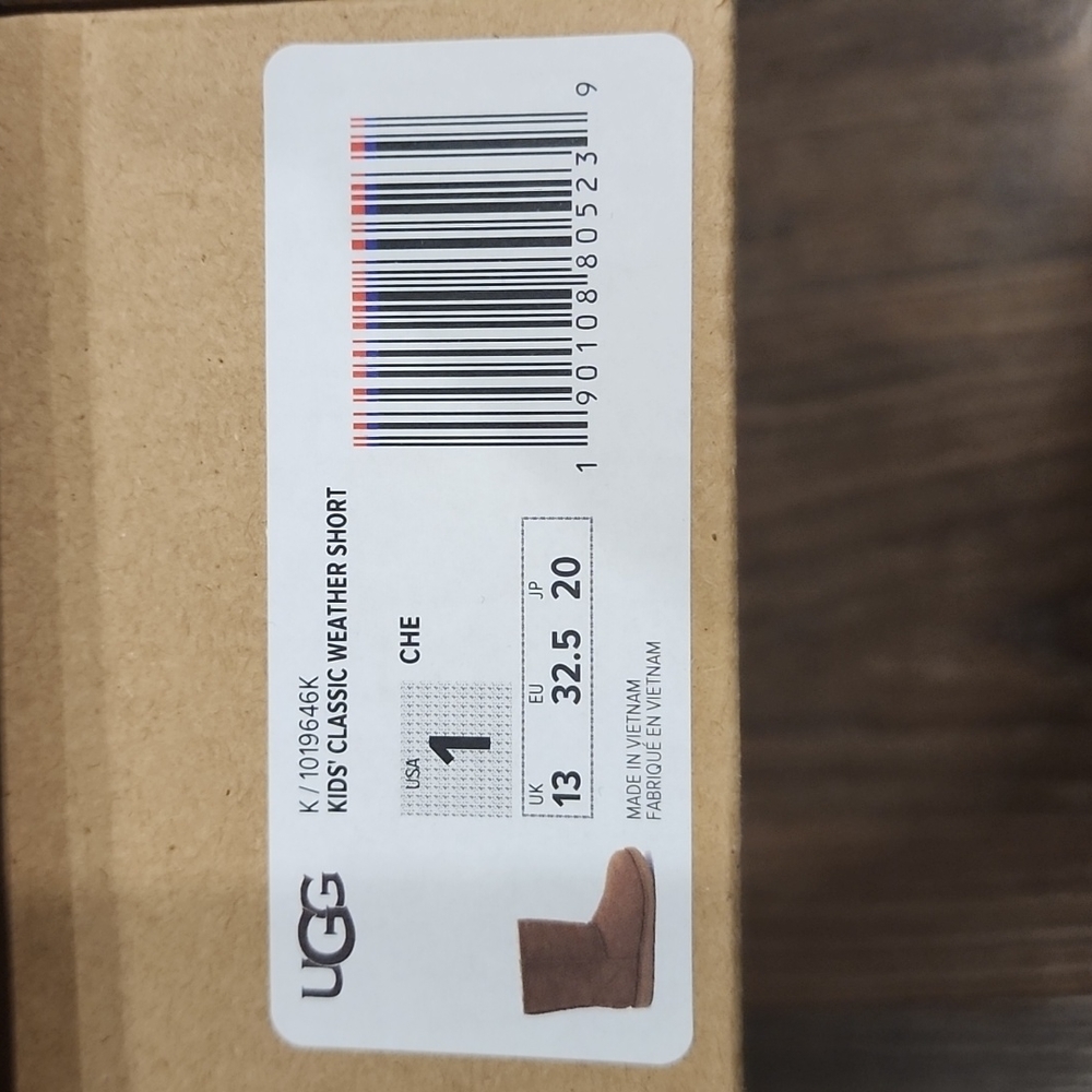 Girls size 1 classic weather short UGG boots.